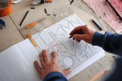 A primary source of Rubin Sans – a plastic stencil tool created by Honza Zamojski. Author: