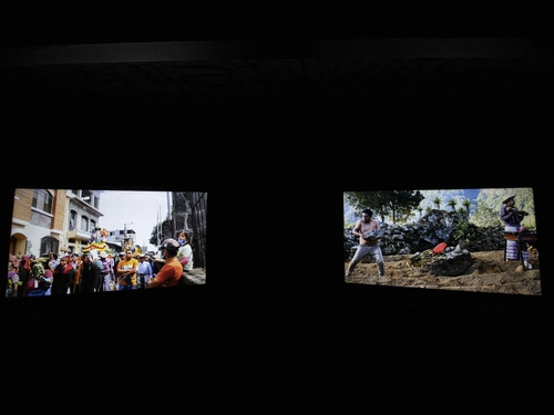 Antonio Pichillá: The Offering. Installation view, MGLC Švicarija, Ljubljana, 2024.  Bailando con una piedra / The Stone Dance, two-channel video, 2022.