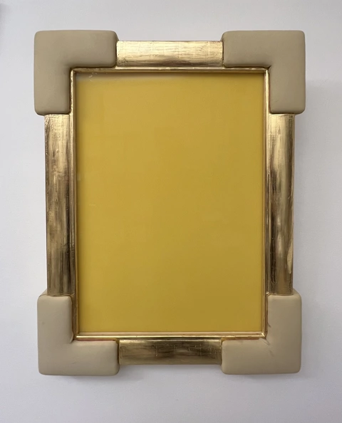 IRWIN (Miran Mohar), Yellow Monochrome, 2020–23, printed foam rubber, gold leaf, wood, fabric, non-reflective UV glass. Photo: archive of the artist.